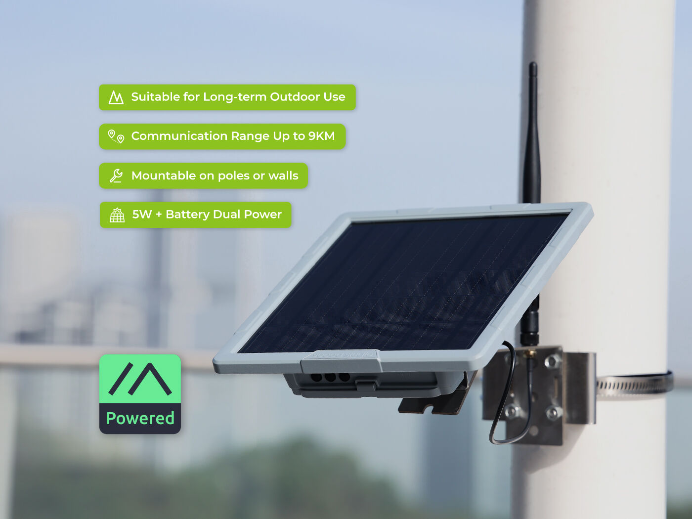 A SenseCAP Solar Node mounted on a pole — a compact solar-powered mesh node with an integrated solar panel and a short antenna.